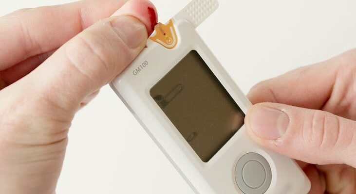 person using a glucometer