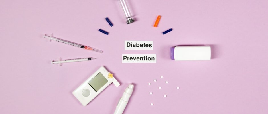 diabetes prevention text on pink background with medical supplies