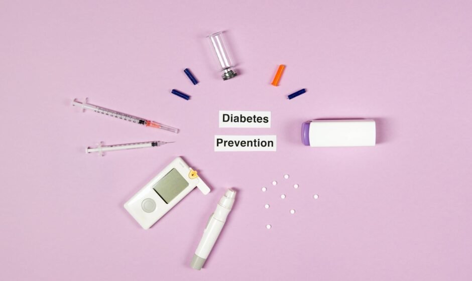 diabetes prevention text on pink background with medical supplies